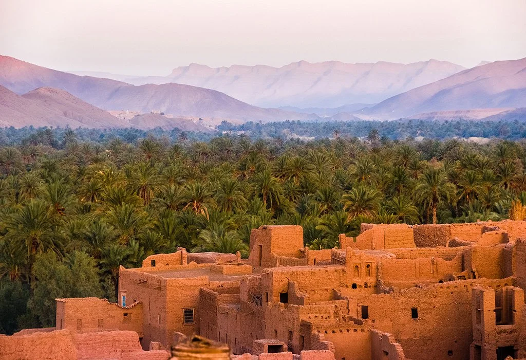Desert oasis with ancient mud buildings